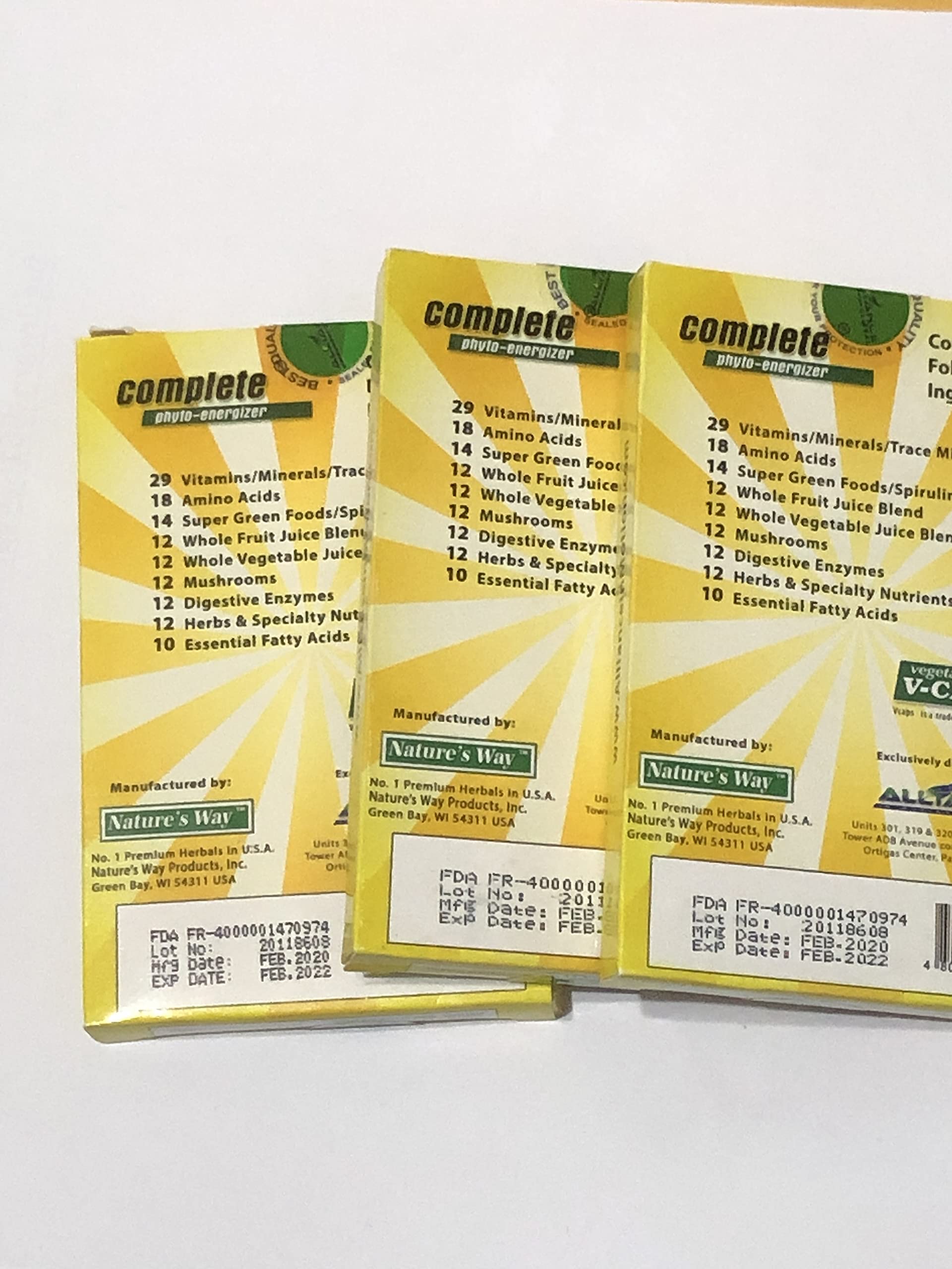AIM Global Complete Phyto-Energizer serving-size illustration showing daily capsule routine