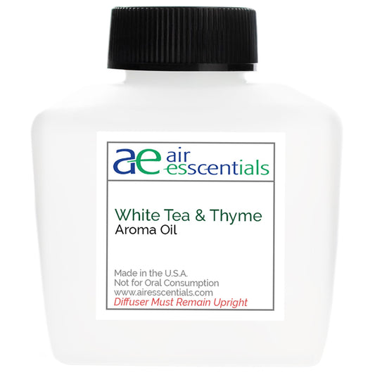 Air Esscentials White Tea Thyme diffuser oil bottle for long-lasting ambient scent.