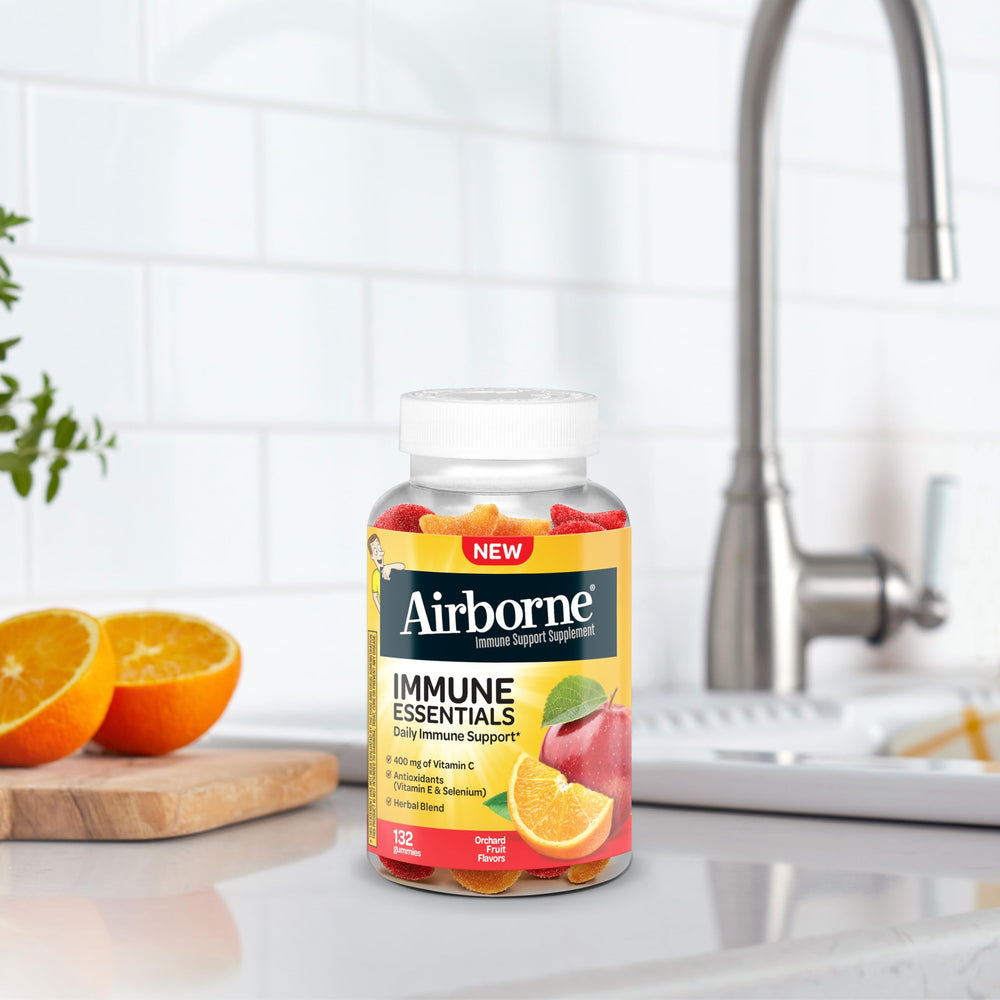 Airborne Immune Essentials two bottle pack on a kitchen counter.