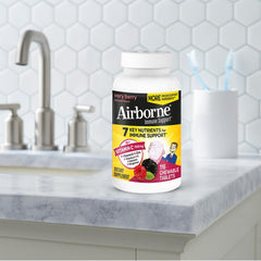 Airborne packaging and bottle; clearly labeled vitamins and minerals for daily use.