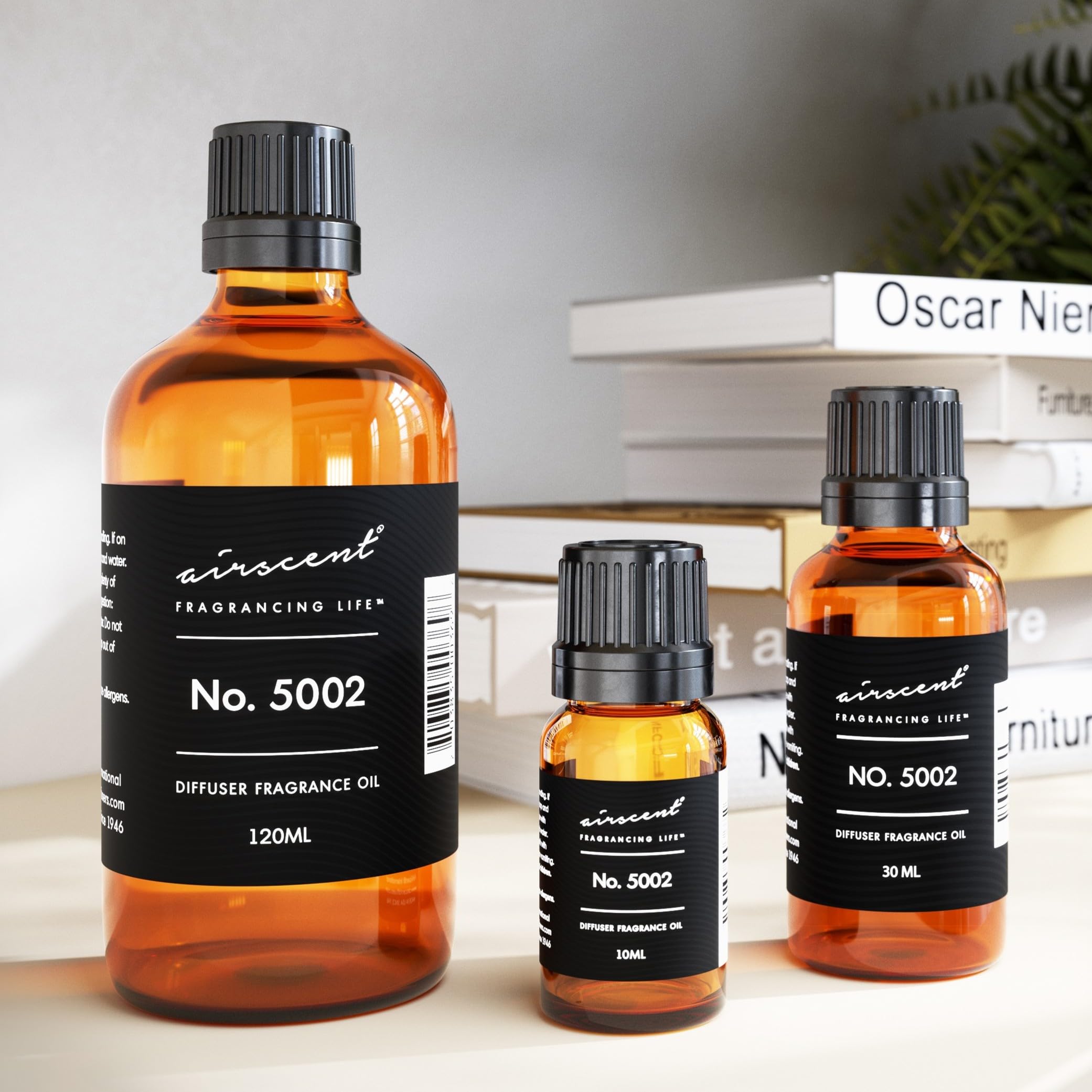 Air-Scent Creed Aventus-inspired diffuser oil bottle with amber glass and elegant packaging.
