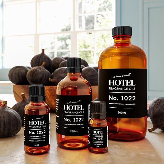 AirScent No.1022 tangelo glass bottle displays vibrant aroma throughout rooms.