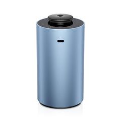Airversa ANX diffuser in ice blue on tabletop delivering room-filling fragrance