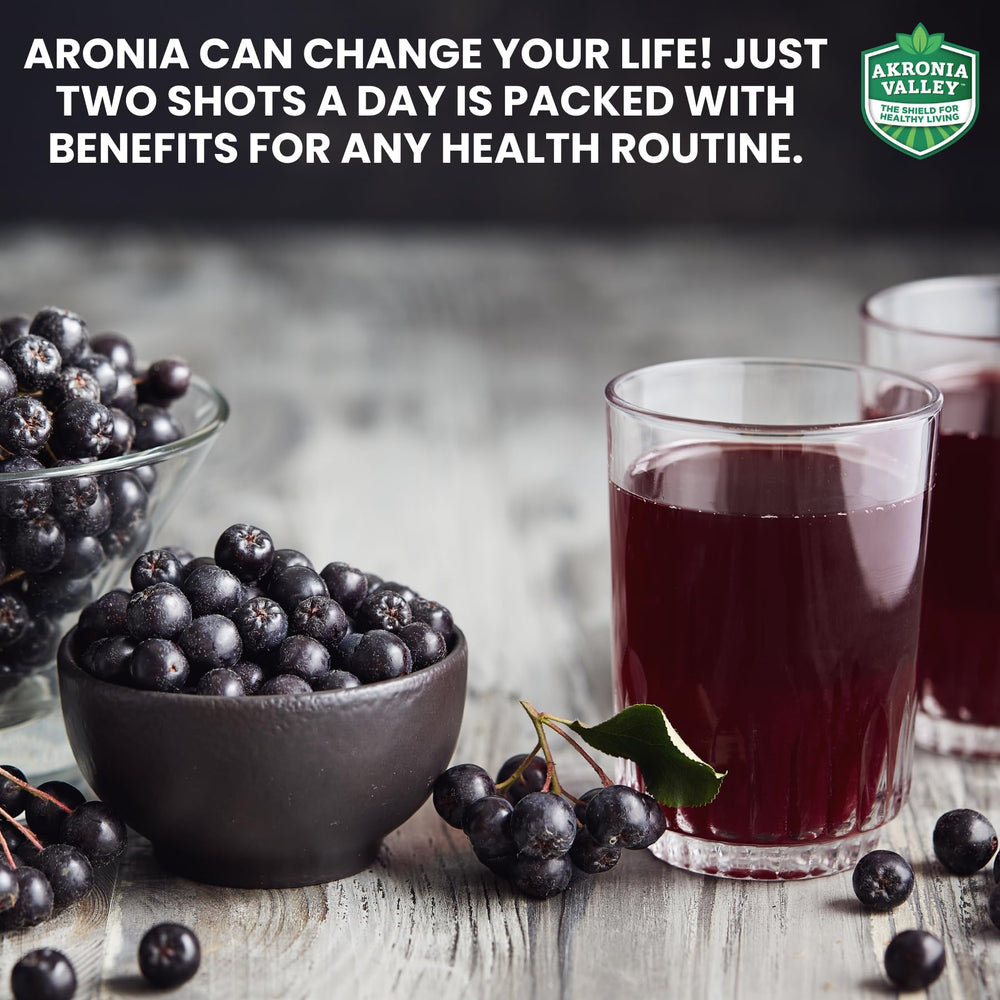 Glass of Akronia Valley Aronia juice with a tart, deep purple hue.