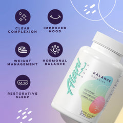 Alani Nu Balance bottle-pour captures a quick daytime supplementation moment.