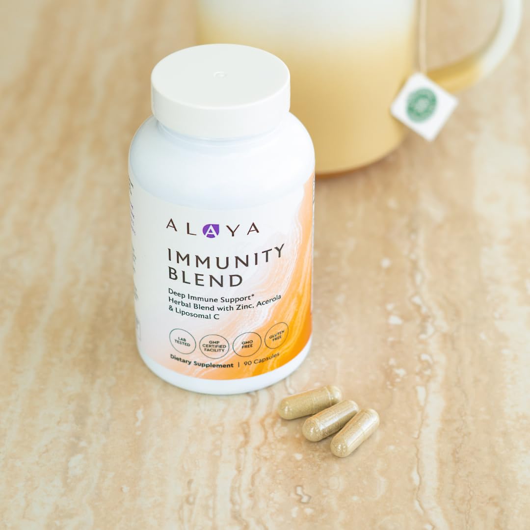 Ingredients scene with Moringa, Elderberry, and Ginger visuals near the bottle