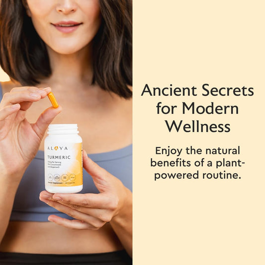 Alaya Naturals turmeric capsules close-up emphasizing 95% curcuminoids for absorption.