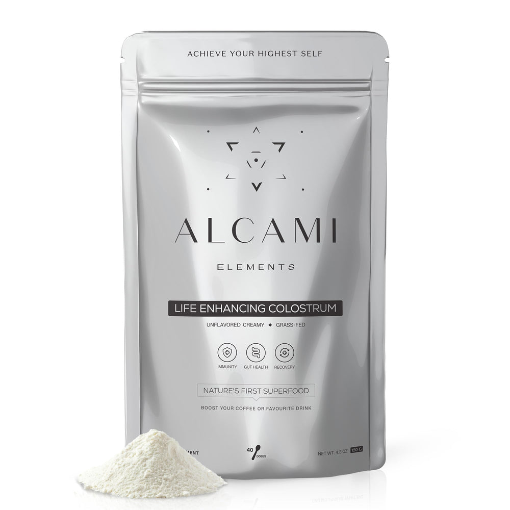 alcami elements colostrum powder bottle front showing premium immune support.