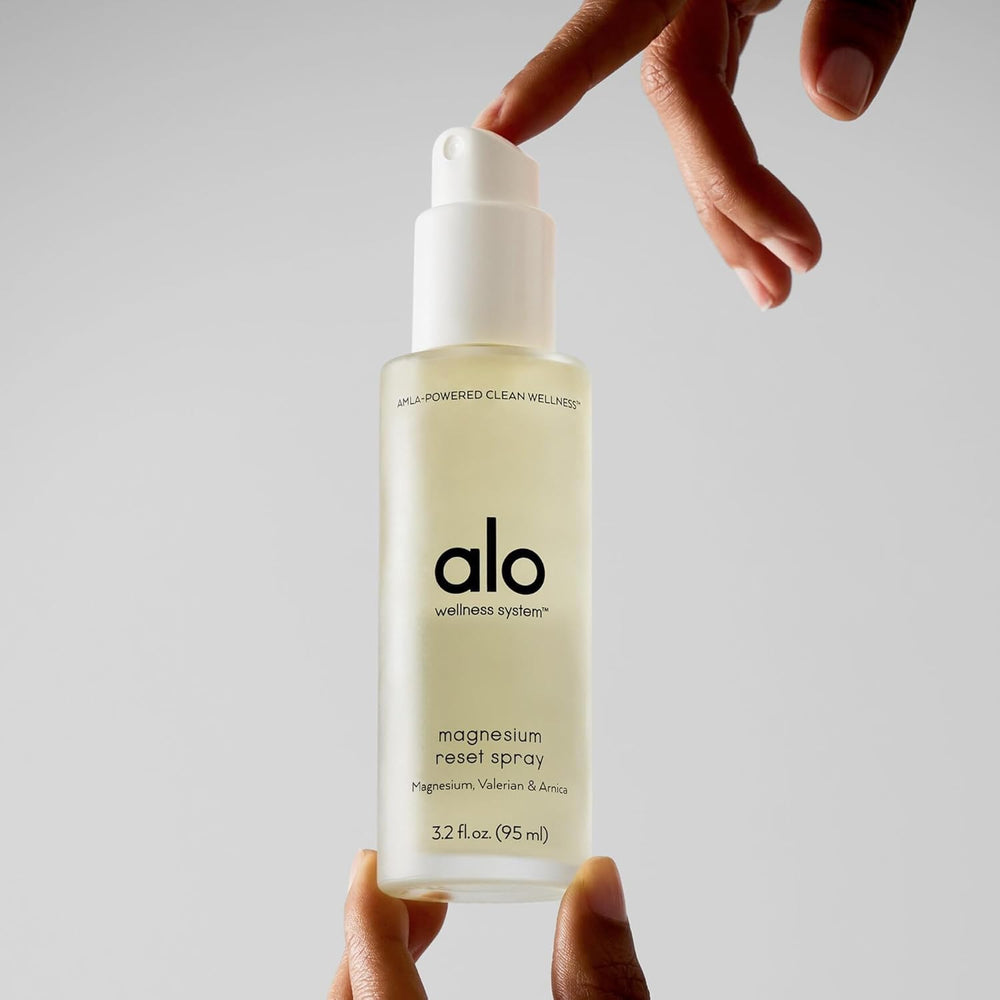 Alo Mini Magnesium Reset packaging, travel-friendly size for on-the-go relaxation