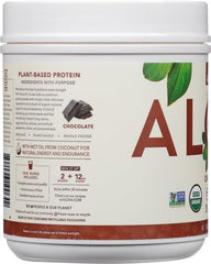 Scoop of ALOHA protein powder ready for blending in the tin.