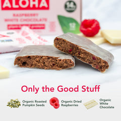 Sliced ALOHA Raspberry White Chocolate bar exposing creamy center and fruity notes