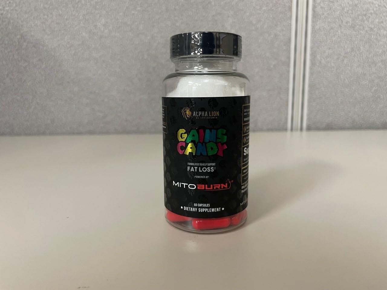 ALPHA LION Gains Candy bottle label emphasizes keto-friendly formula.