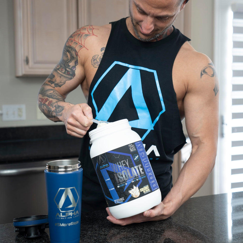 Alpha Nutrition Labs coconut flavor shake at gym or post-workout.