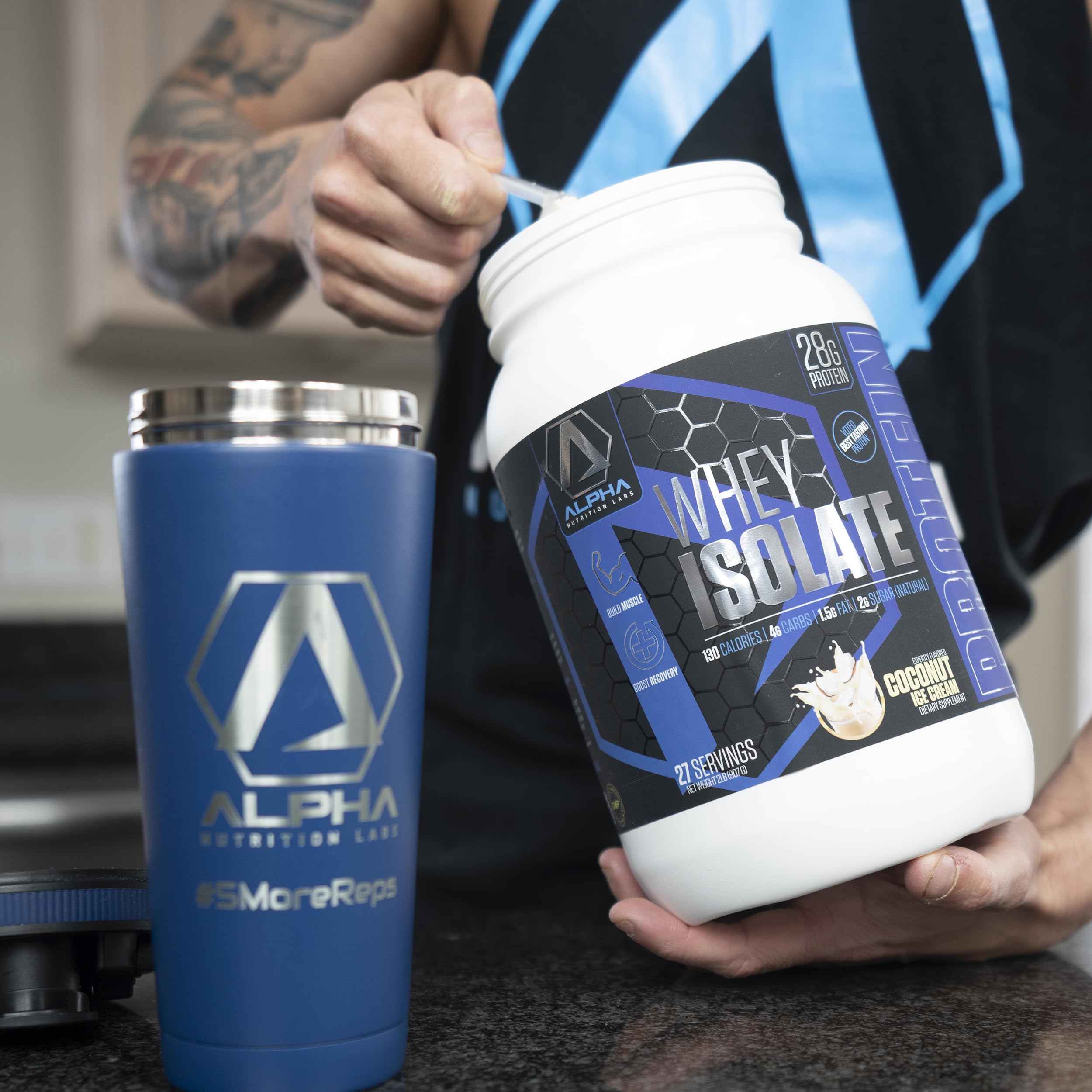 Alpha Nutrition Labs whey isolate tub label close-up highlighting 28g protein.