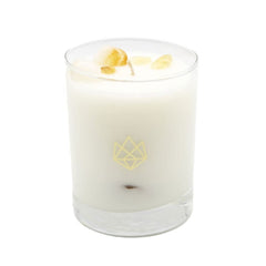 Aluminate Life Citrine-infused candle in glass jar for focused creativity and ambiance.
