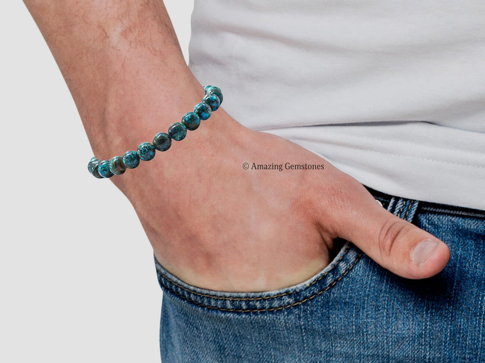 Amazing Gemstone Chrysocolla bracelet worn on model's wrist.