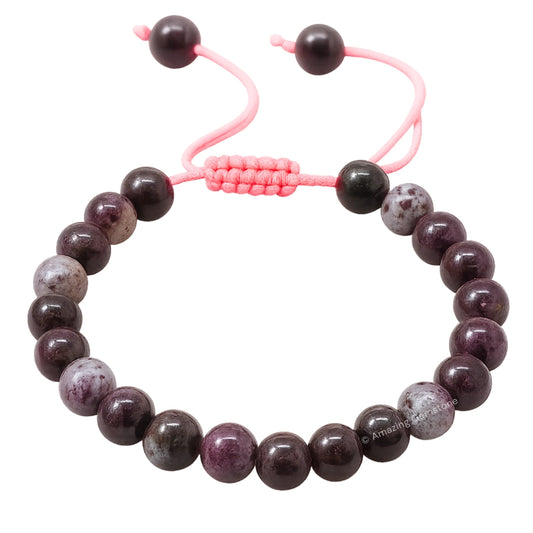 Closeup of natural Eudialyte beads on the Amazing Gemstone bracelet.