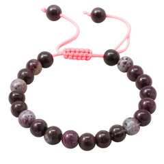 Closeup of natural Eudialyte beads on the Amazing Gemstone bracelet.