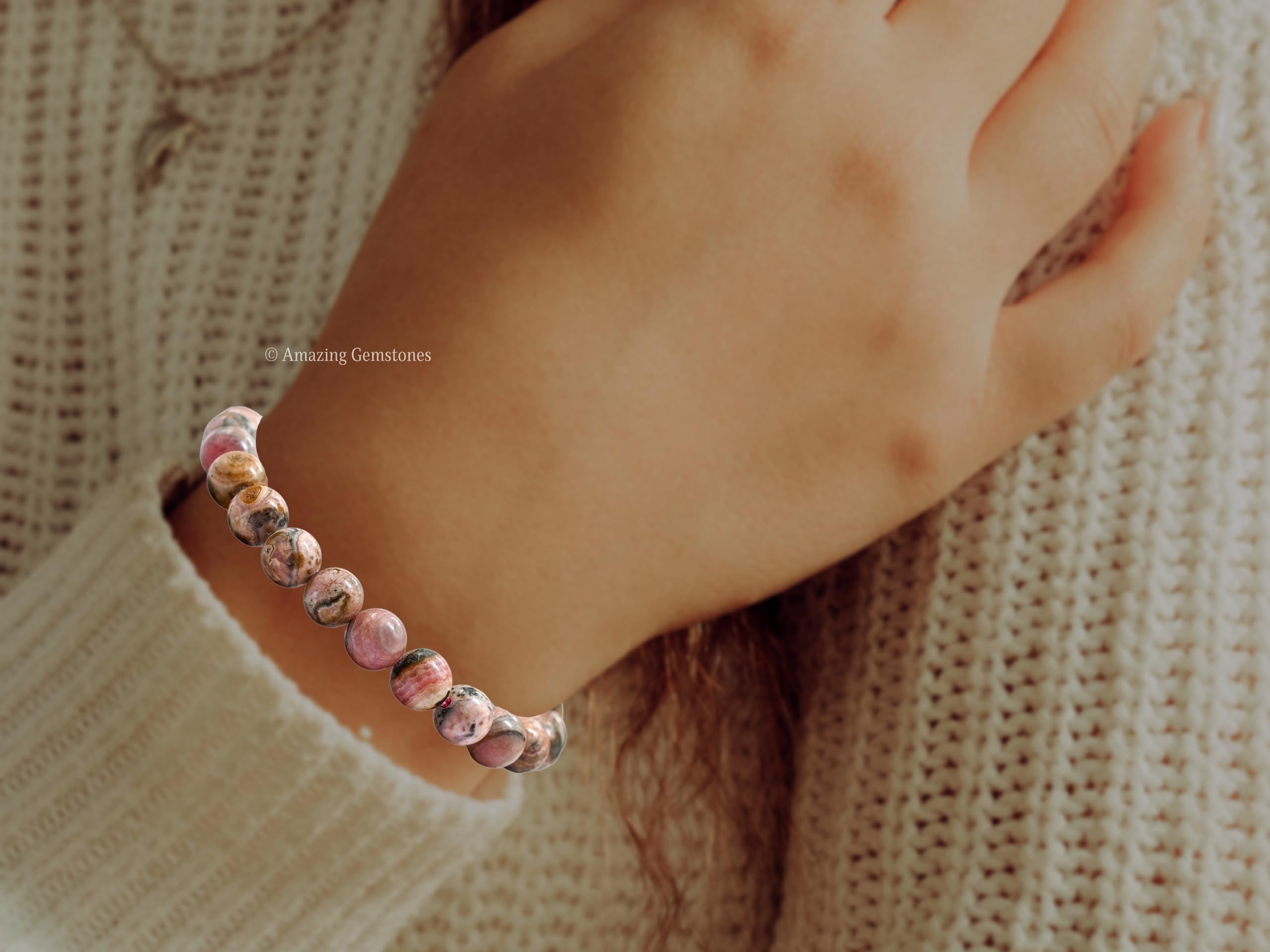 Packaging view of Amazing Gemstone Rhodochrosite Bracelet in zip bag for gifting.