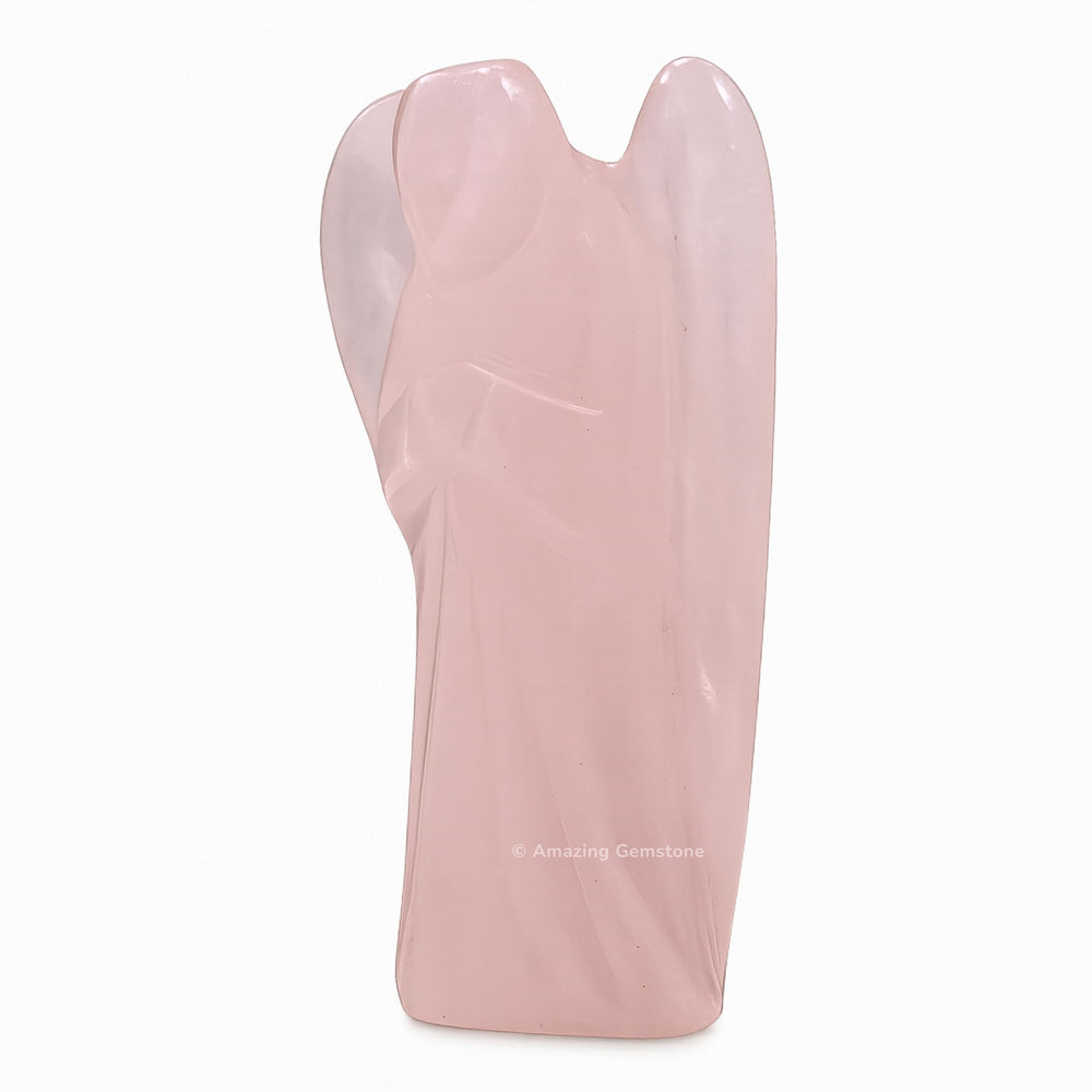 Amazing Gemstone Rose Quartz Angel close-up reveals carved crystal details for display.