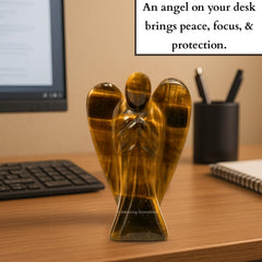 The 4-inch Tiger Eye Angel stands as a portable talisman