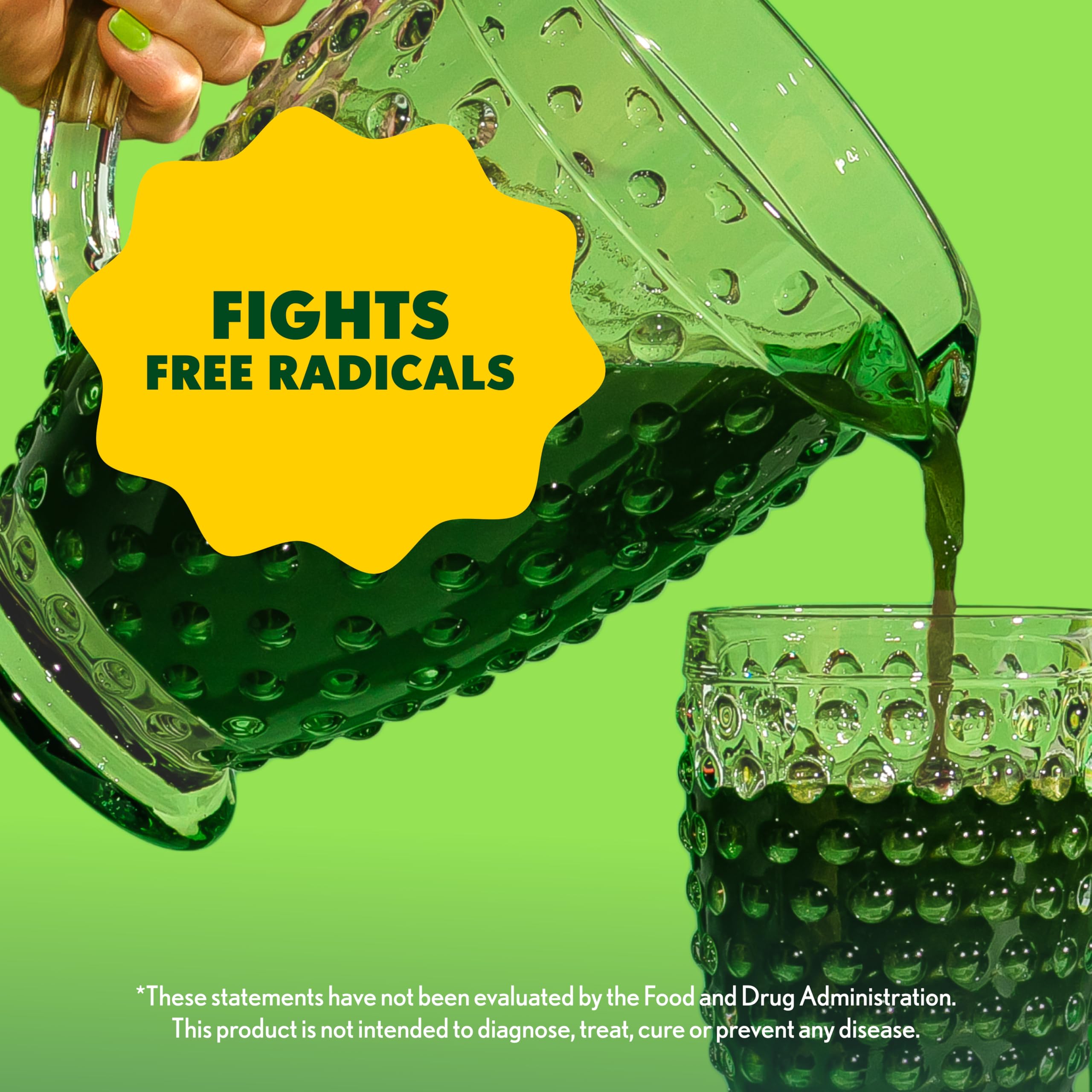 Amazing Grass Greens Superfood dissolving powder in water demonstrates quick mixability
