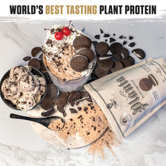 Ambrosia Planta cookies cream shaker bottle ready for post-workout.