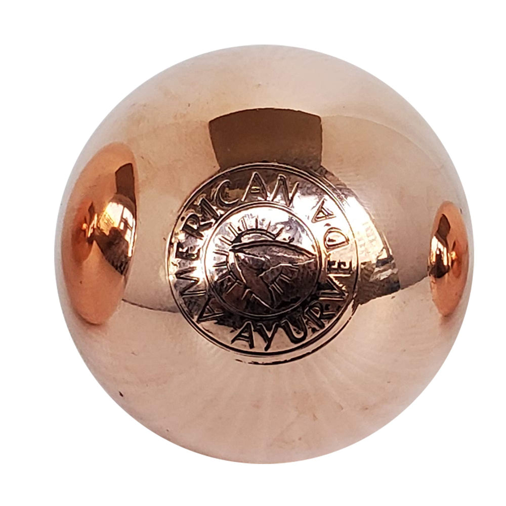 American Ayurveda copper ball with glossy 38mm finish for focused meditation.