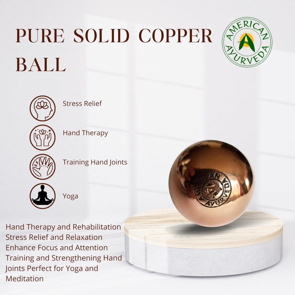 American Ayurveda copper ball held during practice supports dexterity and movement therapy.