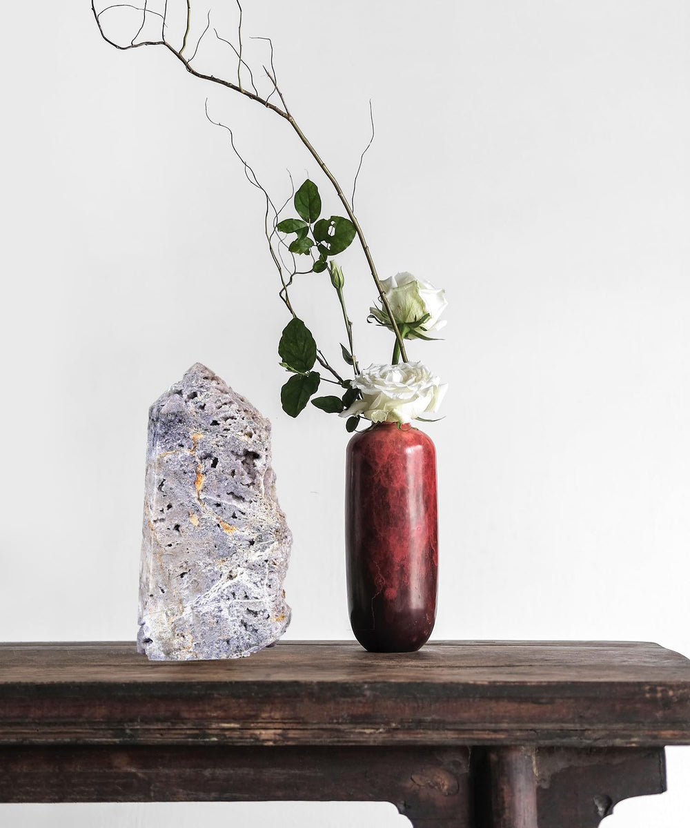 AMOYSTONE emotional healing crystal tower supports balance during journaling and reflection.