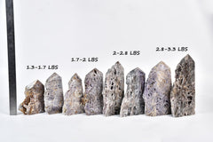 AMOYSTONE gem tower sphalerite sunlit display adds warm ambience.