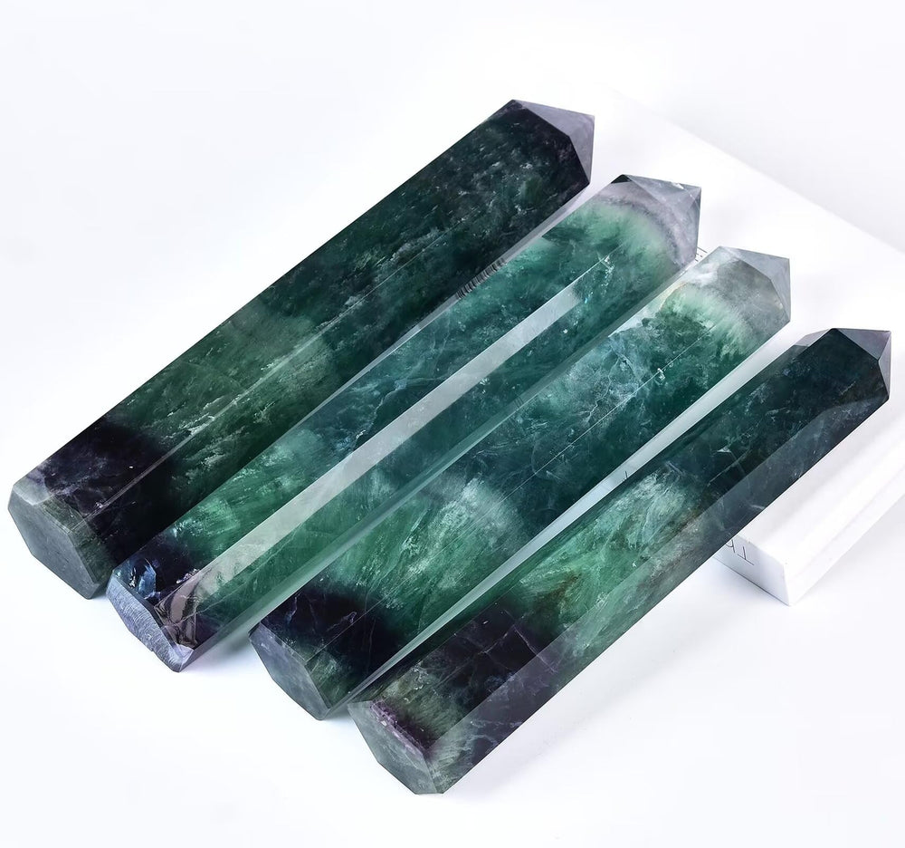 AMOYSTONE fluorite obelisk displayed in living room for calming ambience