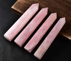 AMOYSTONE hand-polished rose quartz wand offers warm tactile serenity.