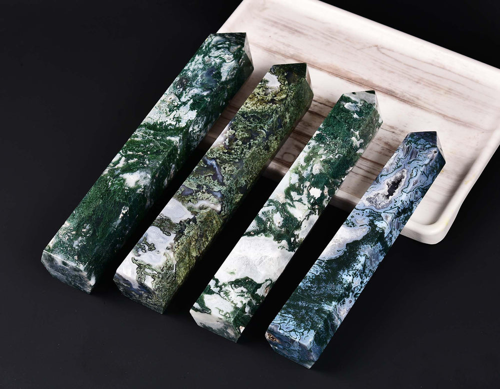 AMOYSTONE moss agate obelisk displayed on an altar setting