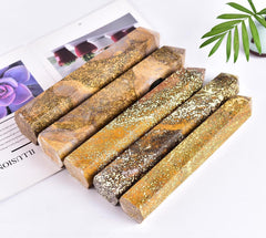 AMOYSTONE ocean jasper wand shown in a calm meditation space.
