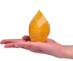 AMOYSTONE orange fluorite tower on desk promotes calm ambiance and productivity