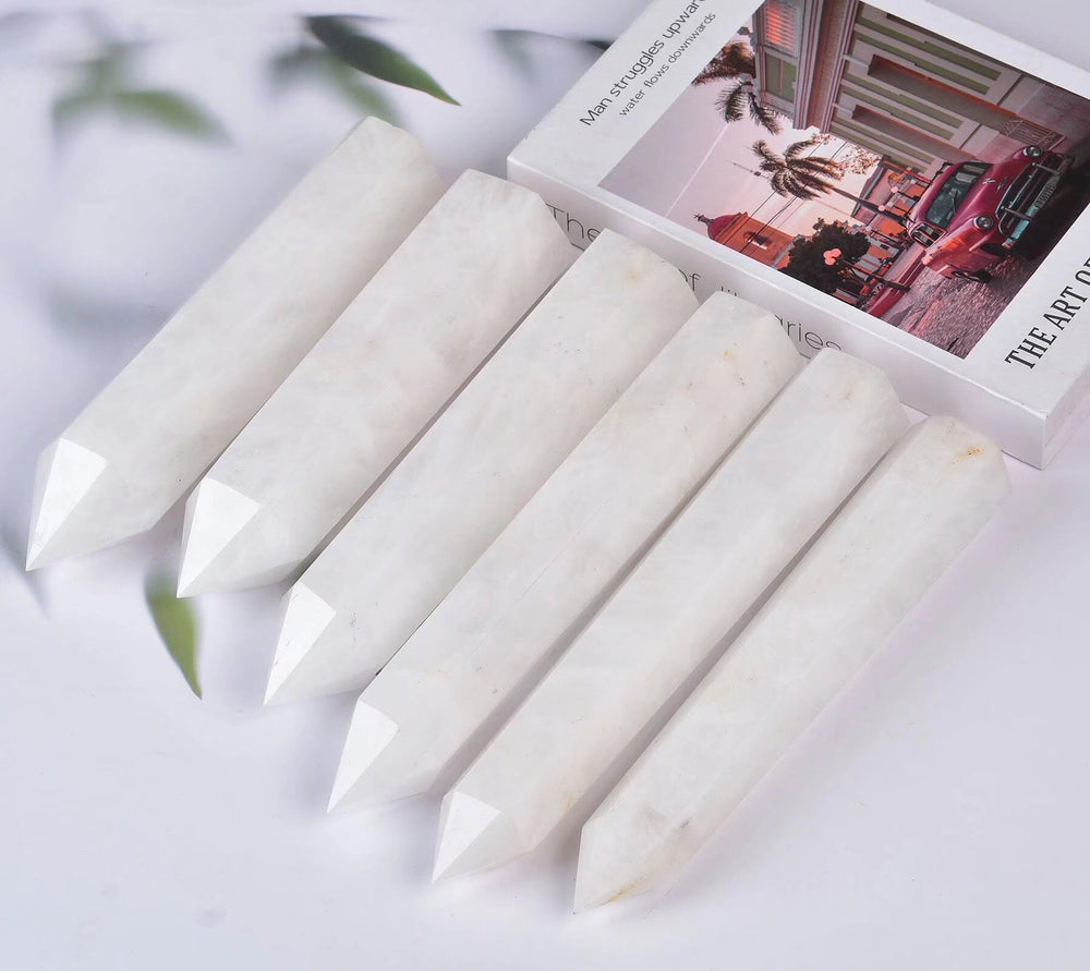 AMOYSTONE polished wand shown in a display for spiritual practice
