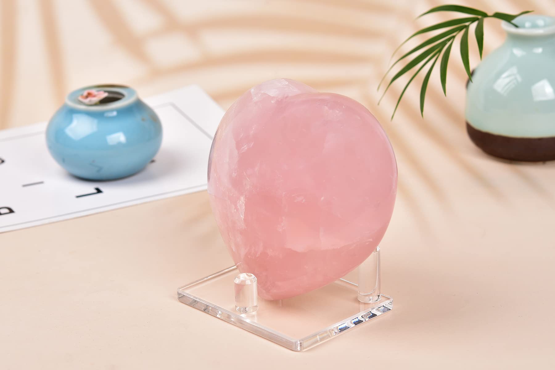 AMOYSTONE rose quartz heart close-up reveals natural texture and pink hues
