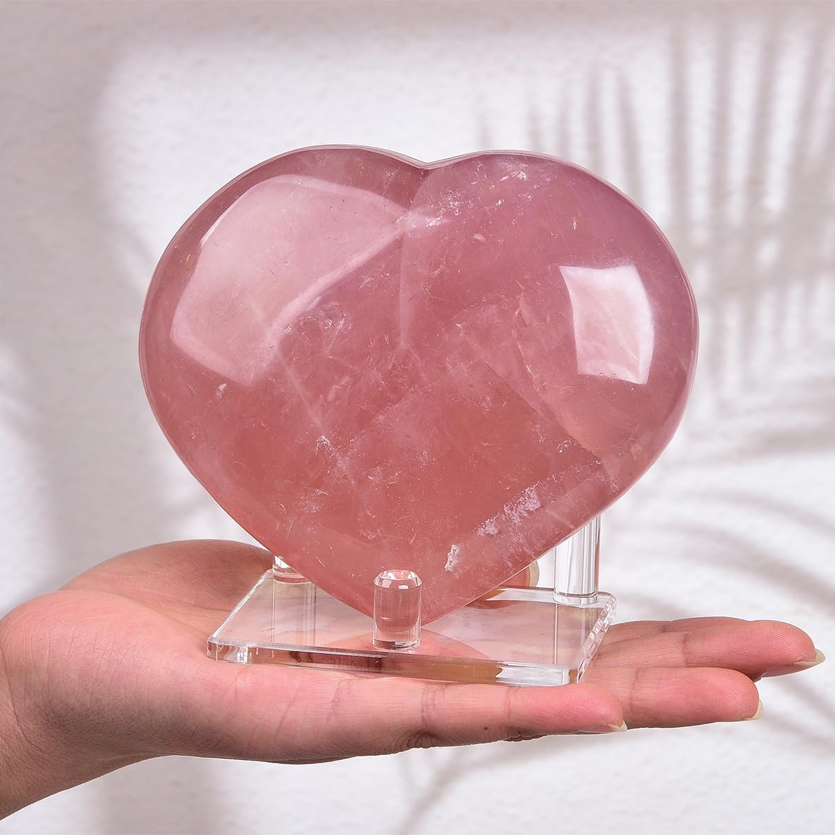 AMOYSTONE heart stone with stand showcased on a shelf for home decor