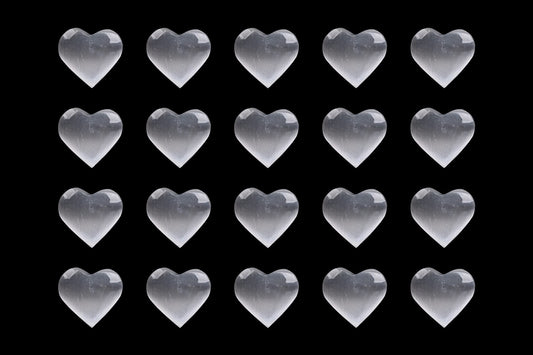 AMOYSTONE pocket-size selenite heart stone fits in hand for on-the-go balance.