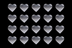 AMOYSTONE pocket-size selenite heart stone fits in hand for on-the-go balance.