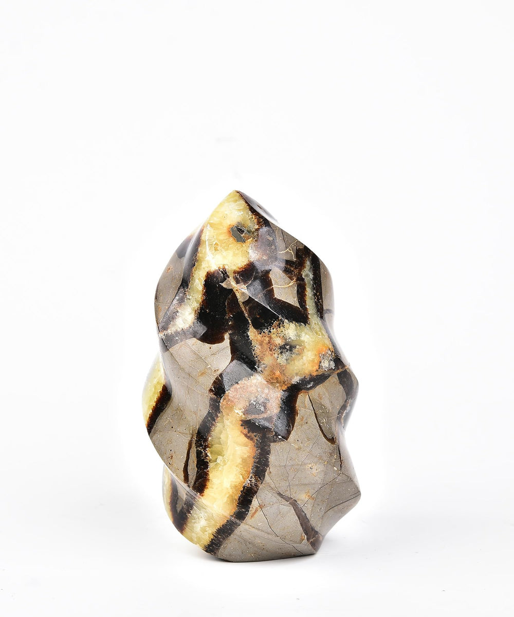 AMOYSTONE Septarian Flame Tower closeup reveals turtle-like cracks and vibrant crystal details for meditation
