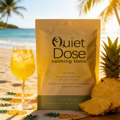 AMUA Quiet Dose Drink pineapple powder mixing with water for a refreshing calm moment.