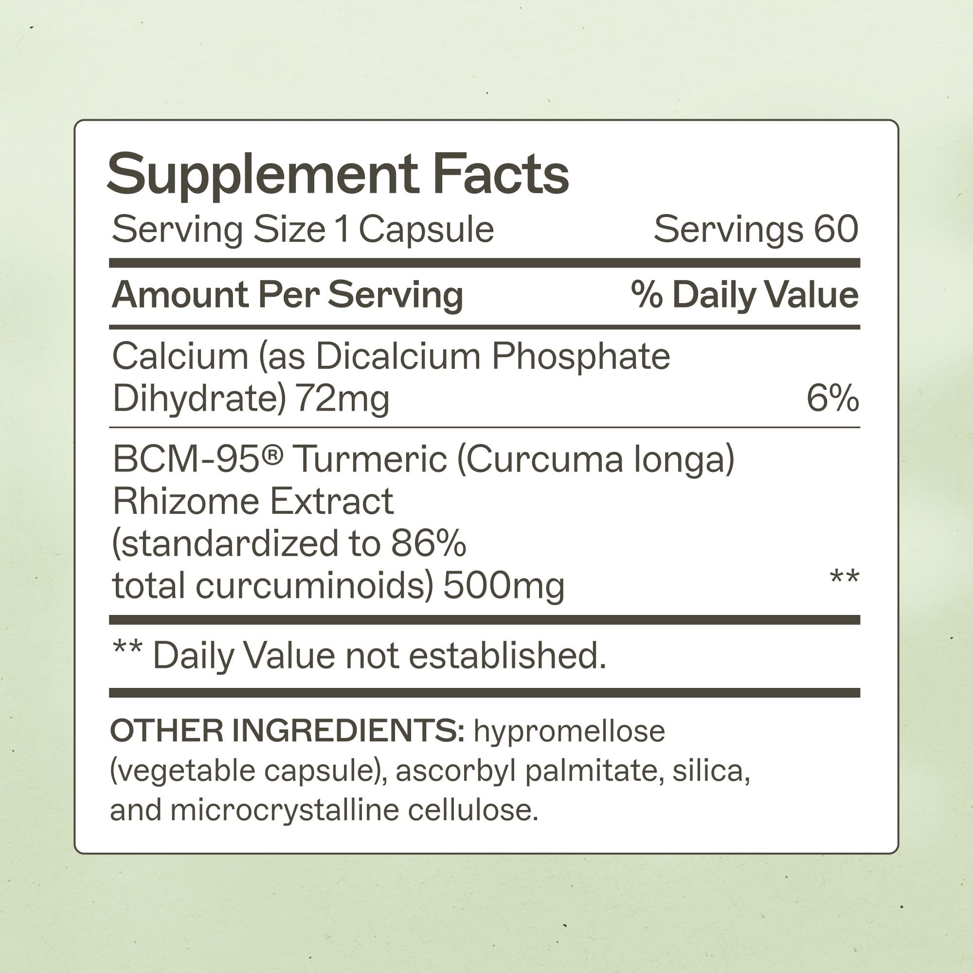 Close-up of capsules emphasizing BCM-95 turmeric for enhanced absorption and gut health.