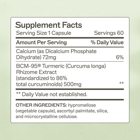 Close-up of capsules emphasizing BCM-95 turmeric for enhanced absorption and gut health.
