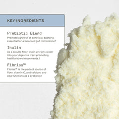 Amy Myers MD organic acacia fiber powder pouring into a glass for easy blending.