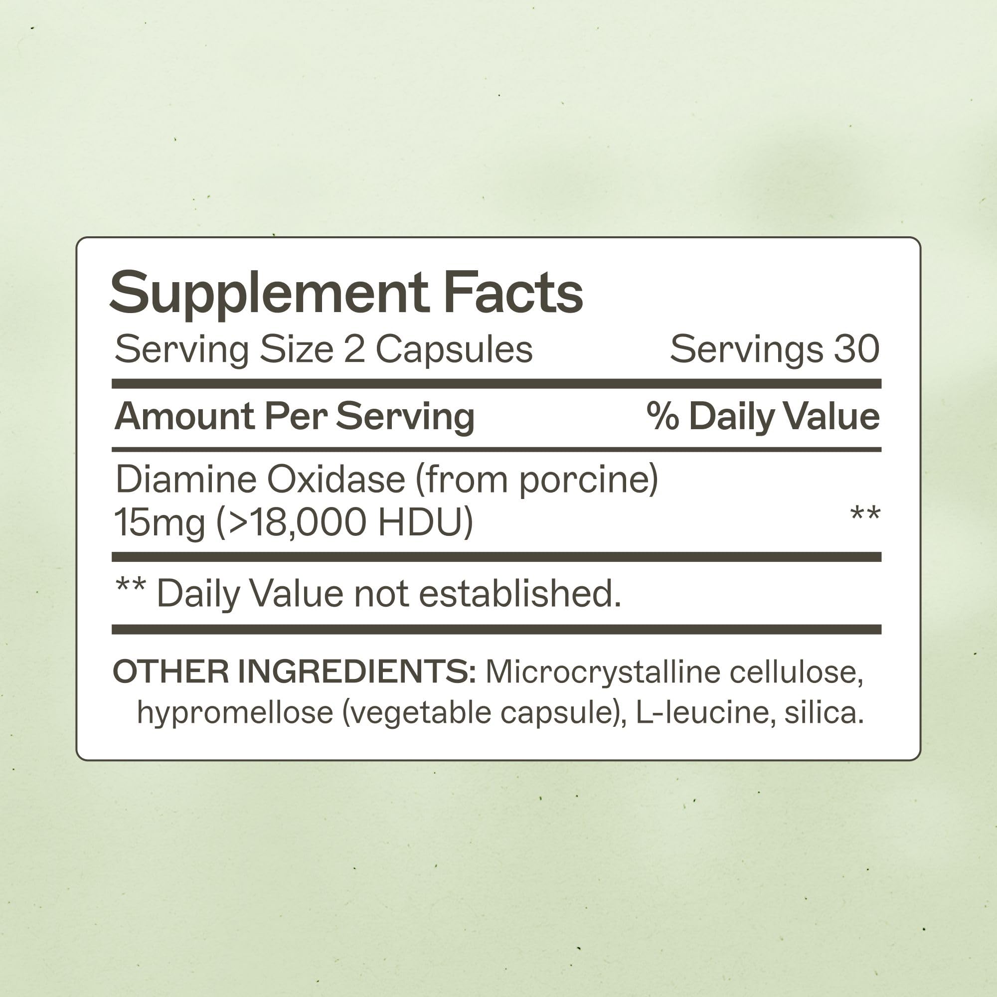 Histazyme capsules closeup showing DAO enzyme support for histamine breakdown.