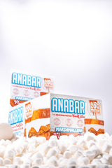 Anabar bar sliced open to show marshmallow center and protein-packed interior.
