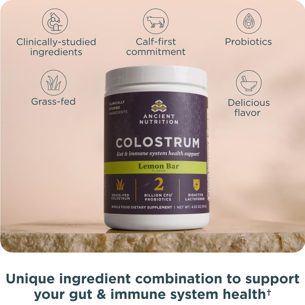 Scoop of Ancient Nutrition Colostrum powder beside a smoothie for easy daily use