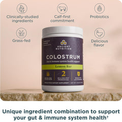 Scoop of Ancient Nutrition Colostrum powder beside a smoothie for easy daily use